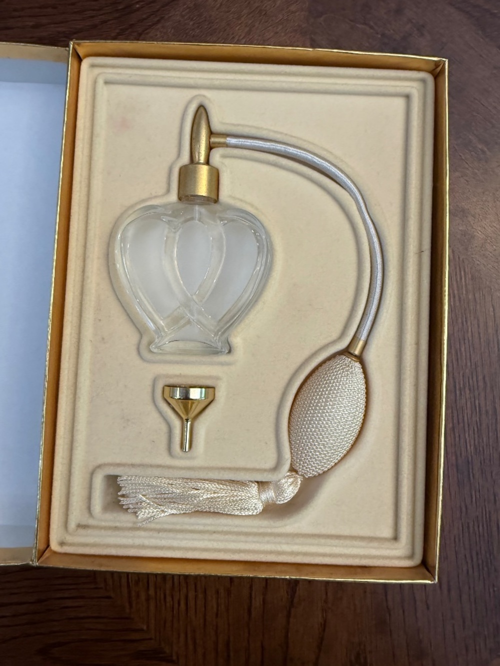 Empty perfume bottle, in box